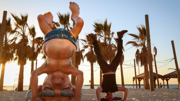 sculpture of first Israeli prime minister Ben Gurion, on the beach