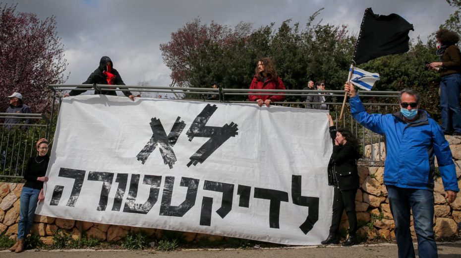 JUSTBIBI Virus, More Dangerous Than Coronavirus Just Not Bibi protesters decry Netanyahu's efforts to combat coronavirus.