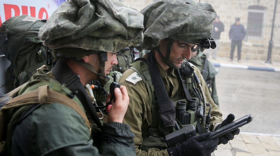 Israeli Soldiers Rescue Palestinian Man Under Attack Israeli soldiers help Palestinian man.