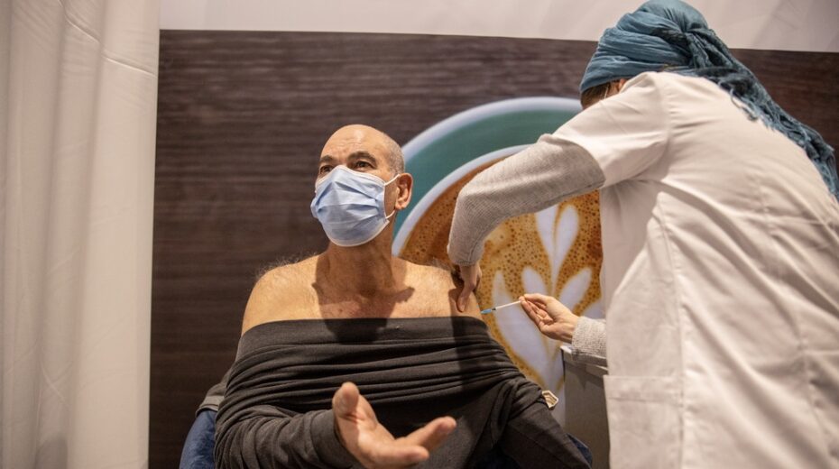 An Israeli receives the Pfizer vaccine
