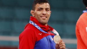 Iranian defector and champion judoka Saeid Mollaei wins his first Olympic medal and dedicates it to Israel.