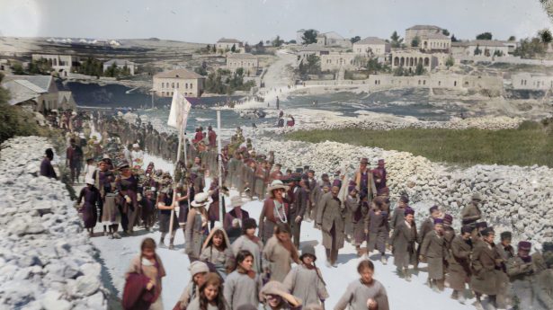 Jewish children and adults marching the Nablus Road toward the tomb of Shimon Hatzadik, 1918.