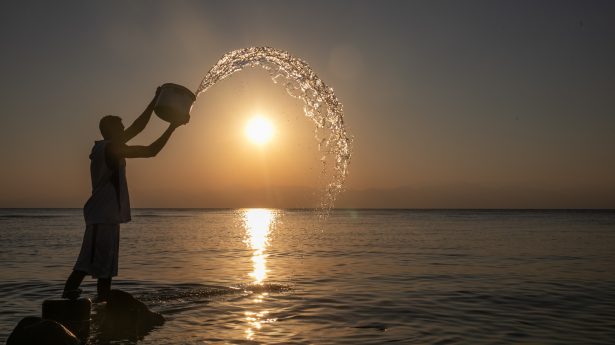 A local fisherman looks for the catch of the day.