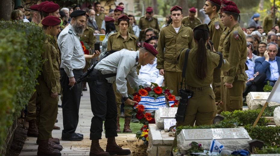 Israel Reinters the IDF’s First Fallen Paratrooper Yoav Bruner, commander of the IDF Paratroopers Brigade, during the funeral of Auschwitz survivor Martin Davidovich in the Mount Herzl Military Cemetery in Jerusalem, on October 28, 2021.