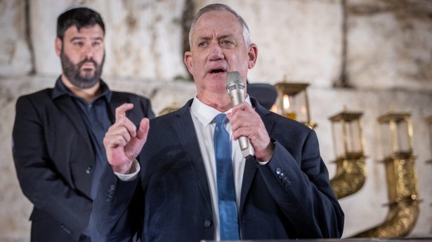 Defense Minister Benny Gantz addresses those gathered to light the first Hanukkah candle at the Western Wall.
