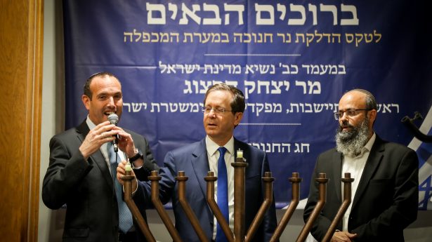 Israel President Isaac Herzog marks the start of Hanukkah at the Cave of the Patriarchs in Hebron, where Abraham, Isaac and Jacob are buried.