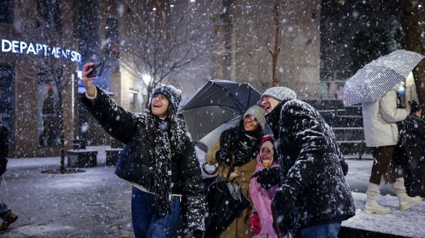 Jerusalemites wait in anticipation for this brief moment of snowy bliss.