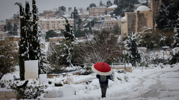 A stroll through snow-covered Jerusalem.