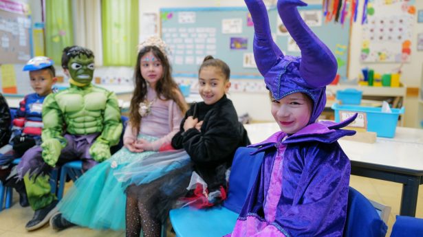 Not a mask in sight, besides those being worn by the children.