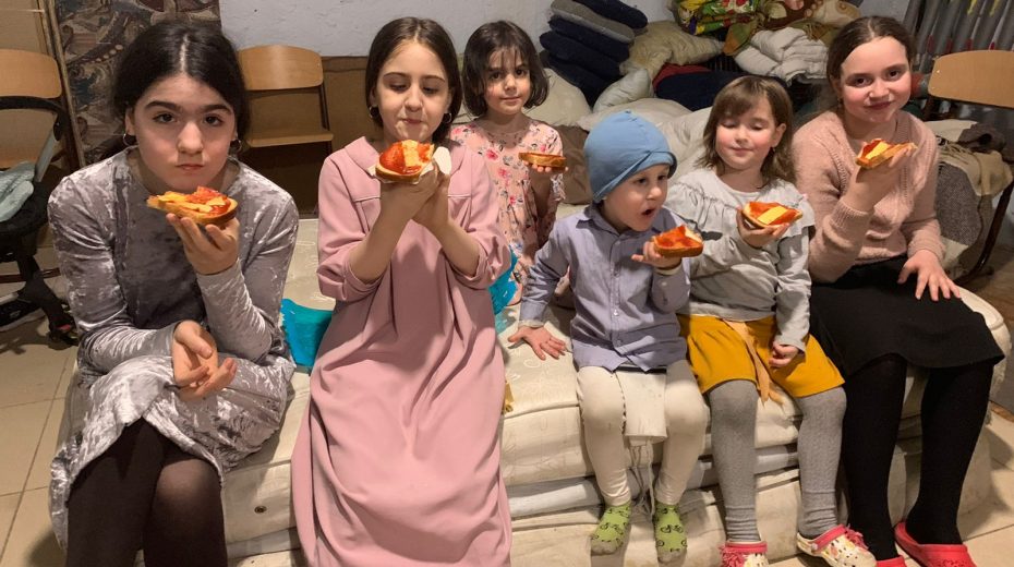 Gentile Ukrainians Hiding in Synagogues Children, both Jewish and Gentile, find shelter in the basement of a local synagogue in Ukraine.
