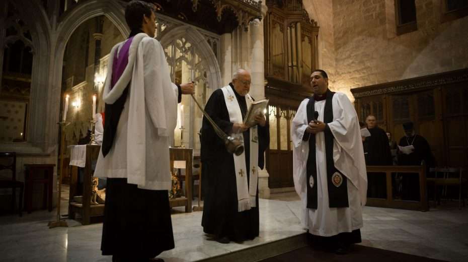 A serious heresy Christians pray at the Cathedral of St. George in Jerusalem.