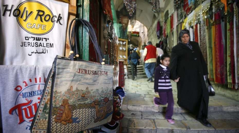 Uniting Yerushalayim – Jerusalem of Gold and Silicon?! Tourism has proved a boon for both East and West Jerusalem - tourist souvenirs and T shirts in the Old City. But the city remains the poorest in Israel, and officials hope that raising the quality of life will reduce tensions and hostility.
