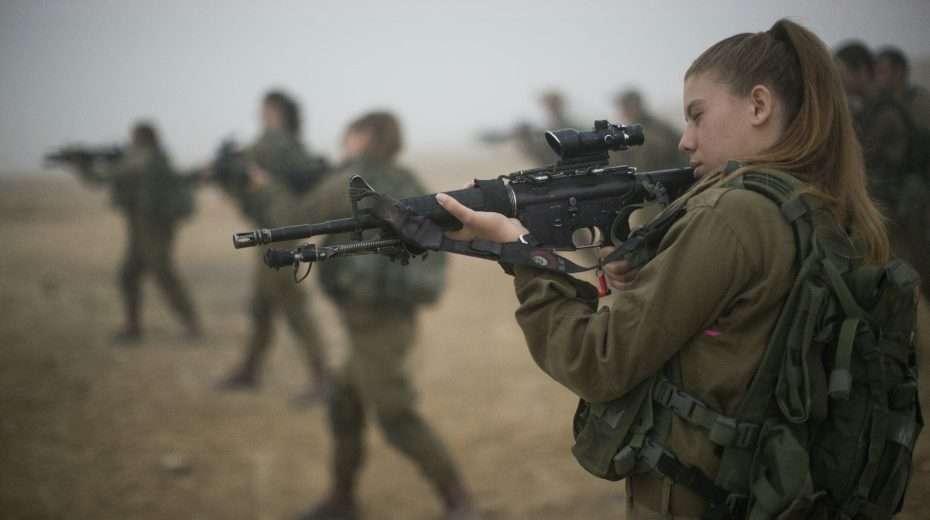 IDF to Open Elite Combat Units to Female Soldiers Female Israeli IDF soldiers during an exercise.