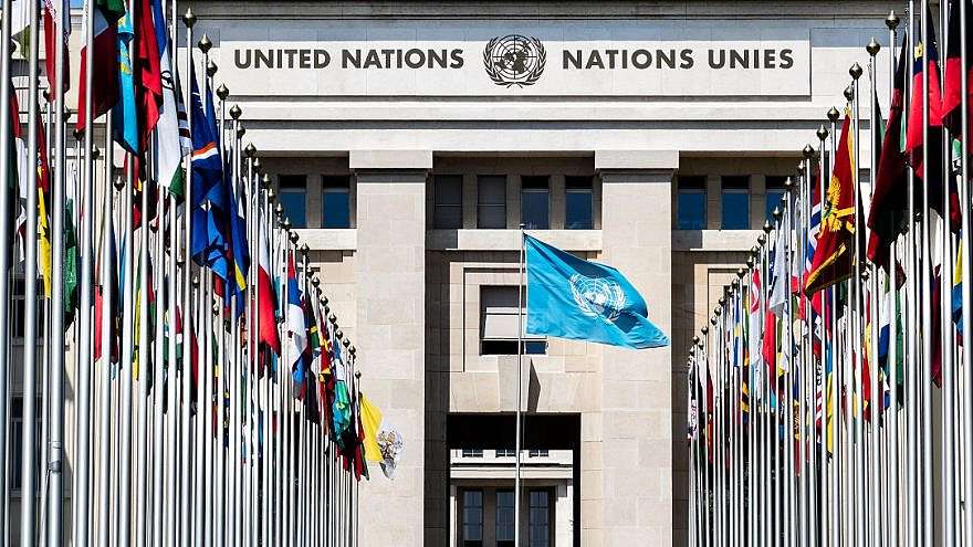 National flags at the entrance of UN European headquarters in Switzerland. The UN office was established in Geneva in 1947 and is home to the UN Human Rights Council.