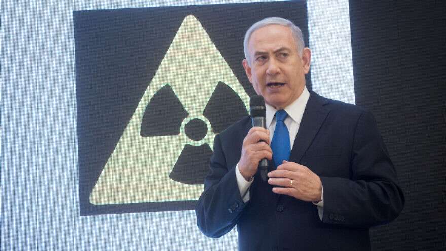 Israeli Prime Minister Benjamin Netanyahu exposes a trove of Iranian documents on Tehran's nuclear program at a press conference at the Kirya government headquarters in Tel Aviv, April 30, 2018.