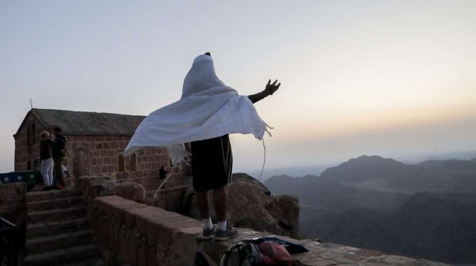 Illustration. A Jewish man cried out to the Lord from atop the traditional location of Mount Sinai.
