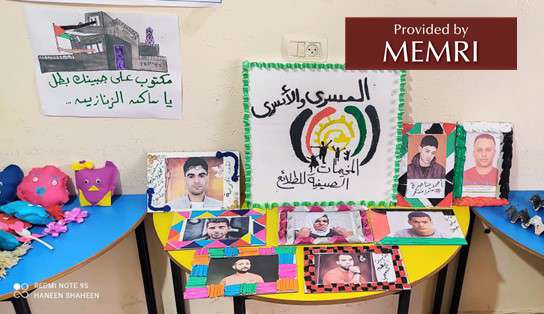 Decorated photos of the six prisoners prepared by children at one of the camps (Facebook.com/hcyspalestine, August 2, 2022)
