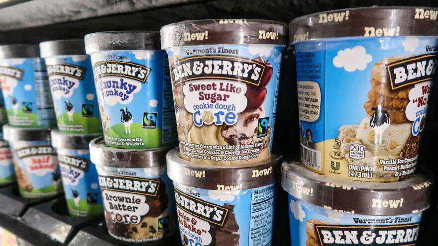 Ben & Jerry's products on the shelf of a grocery store.