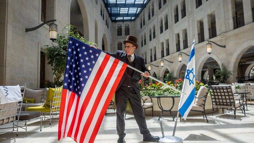 Workers at the Waldorf Astoria in Jerusalem prepare for Biden's visit in July. Could his Iran policies cause a rift in Israel-US relations?