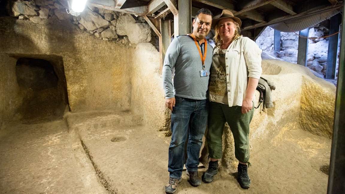 Author with fellow archaeologist Eli Shukron in the entryway to the Melchizedek sacred place.