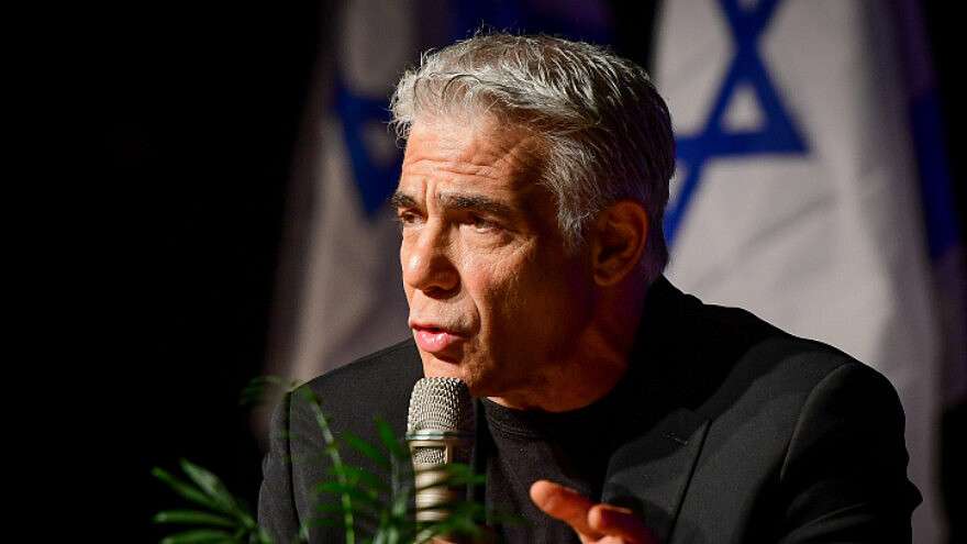 Israeli Foreign Minister Yair Lapid speaks at a conference in Jaffa, June 7, 2022.