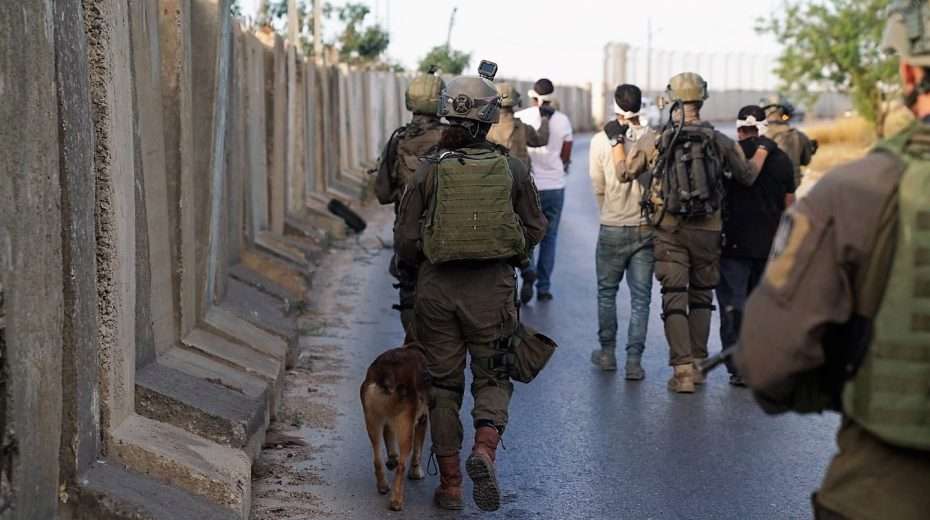 IDF soldiers leading away Palestinian terror suspects after another successful raid.