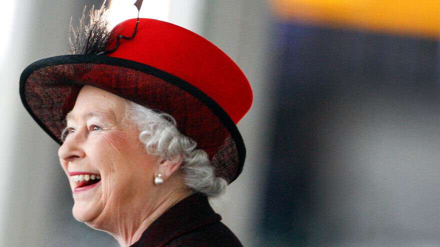 Queen Elizabeth II smiles during a visit in London on March 14, 2008.
