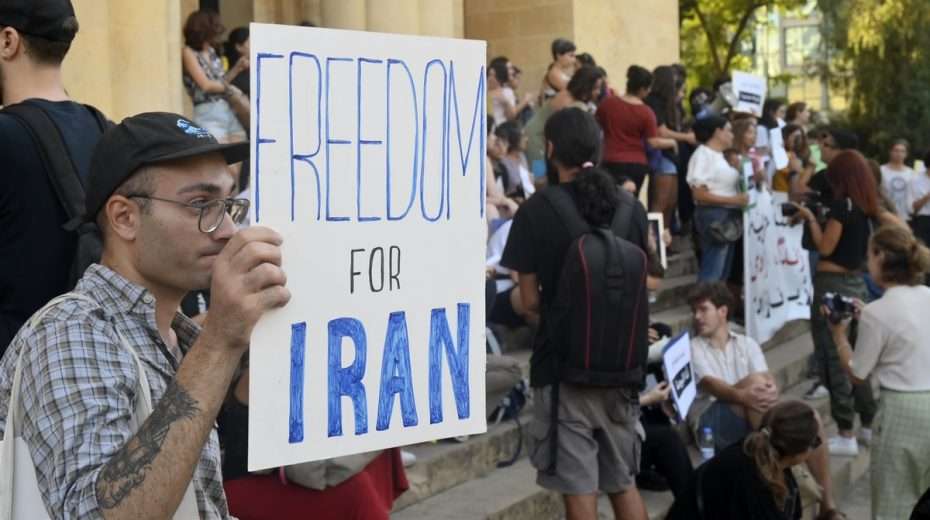 Protesters call for the overthrow of the Iranian regime after a young woman was killed for wearing pants.