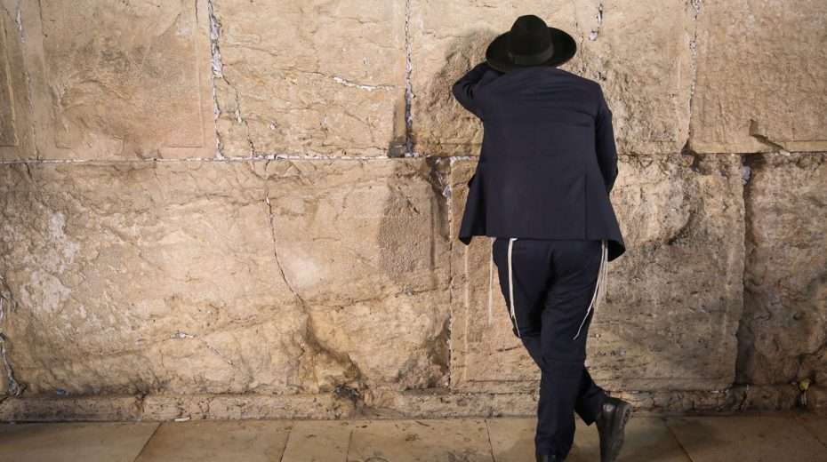 A Jewish man prays at the Western Wall in Jerusalem. We must accept that God answers our prayers according to His will, and be ready to do our part. Then all will things will work together for good.