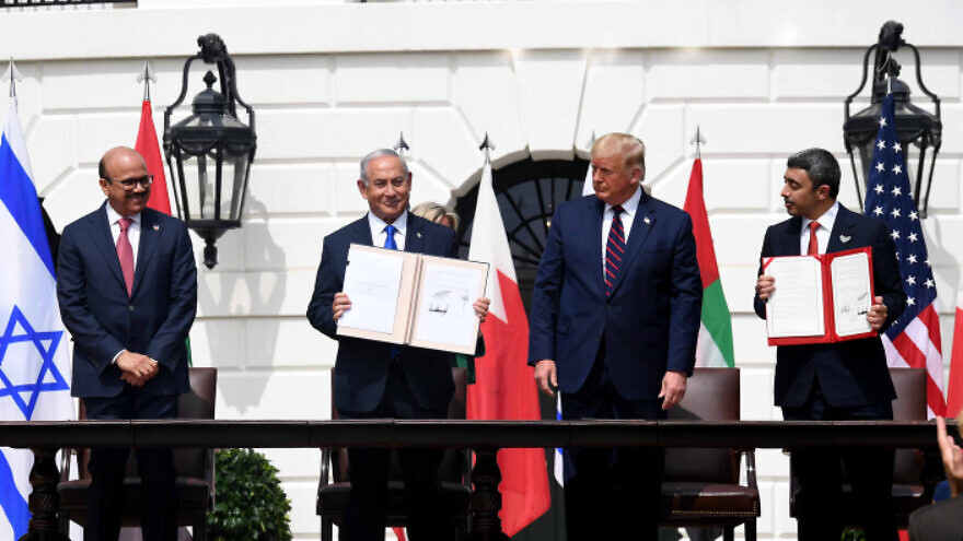 Netanyahu and Bahrain Foreign Minister Abdullatif bin Rashid Al Zayani (left) attend the Abraham Accords signing ceremony at the White House, September 15, 2020.
