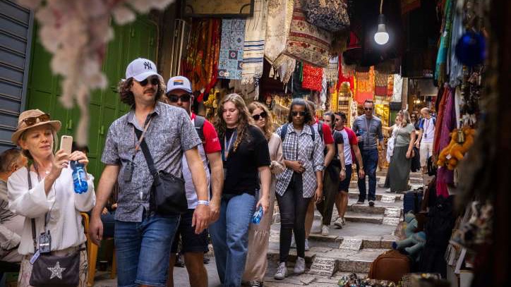 Tourism to Israel is again booming. Visitors walk the streets of Jerusalem's Old City.