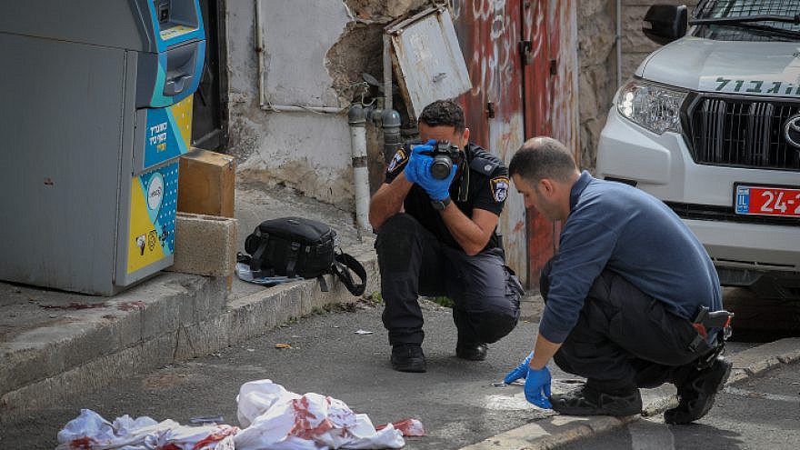 Police at the scene of a shooting attack carried out by a 13-year-old boy in eastern Jerusalem, Jan. 28, 2023.