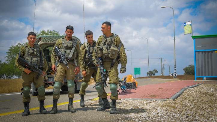 Tachles With Aviel – Israel Needs More Than Peace, It Needs Security Israeli soldiers patrol a road near the Gaza Strip border in southern Israel. Photo by Flash90