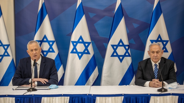 Protest leader says he’s now open to Netanyahu-led unity government Benny Gantz and Benjamin Netanyahu the last time they sat together in a unity coalition in 2020. Photo by Tal Shahar/POOL