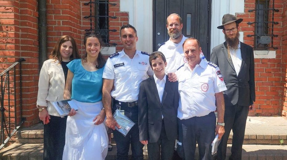 13 years after saving infant, medics join ‘miracle’ bar mitzvah 13-year Shmuel Kovetzik (front, center) celebrating his bar mitzvah on July 19, 2023 with his family and the emergency medics who saved his life. Photo by Magen David Adom.