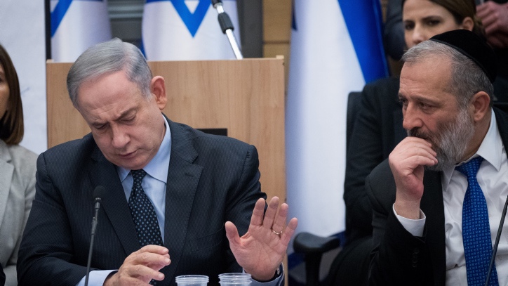 Netanyahu, Rabbis spar over God’s protection of the Jewish people Netanyahu and Shas party leader Aryeh Deri at a cabinet meeting this summer. Photo by Yonatan Sindel/Flash90