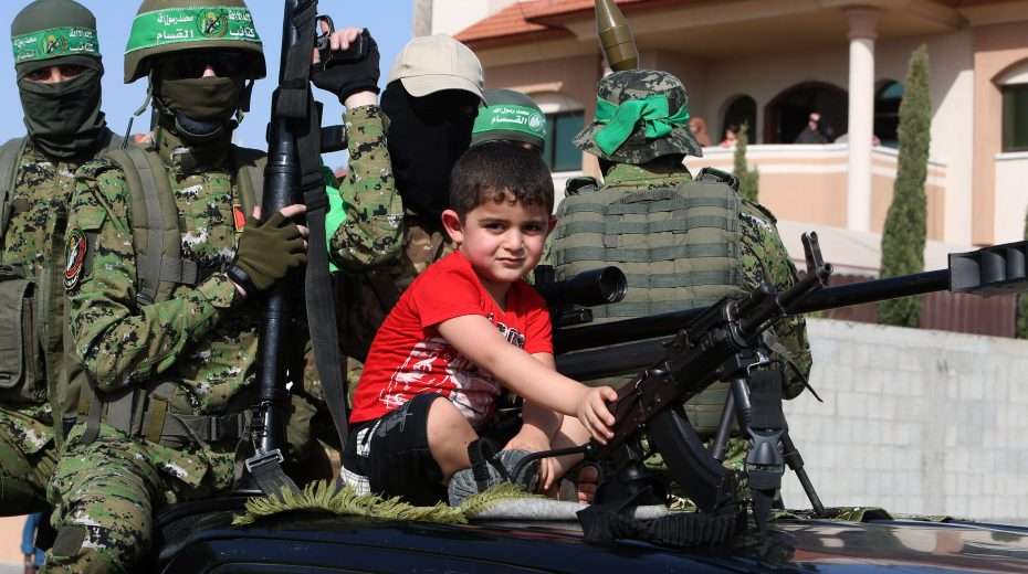 Fake news alert: Amnesty, UN and BBC against settler violence Members of the Izz al-Din al-Qassam Brigades take part in a military parade in Rafah, southern Gaza Strip, on May 28, 2021. Photo: Abed Rahim Khatib/Flash90