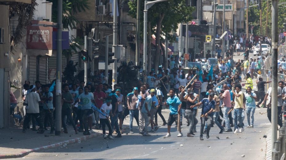 How we got here: The story of Israel’s African migrant crisis Eritrean asylum seekers clash with Israeli police in South Tel Aviv, Sept. 2, 2023. Photo by Omer Fichman/Flash90.