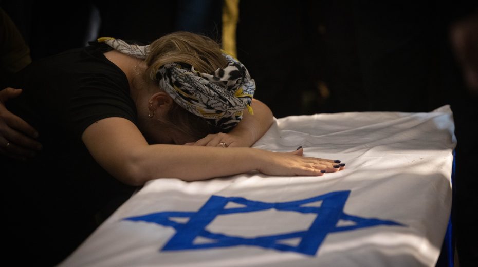 Family and friends of Israeli soldier Yossi Hershkovitz mourn at his funeral at the Mount Herzl Military Cemetery in Jerusalem on November 12, 2023. He was killed during the ground operation in the Gaza Strip. Photo by Chaim Goldberg/Flash90