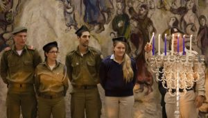 Israeli soldiers take part in a Hanukkah candle lighting ceremony in the Knesset on the sixth evening of Hanukkah. Photo by Flash90