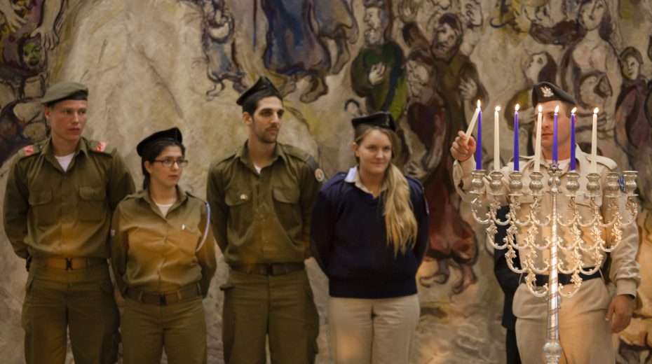 Israeli soldiers take part in a Hanukkah candle lighting ceremony in the Knesset on the sixth evening of Hanukkah. Photo by Flash90