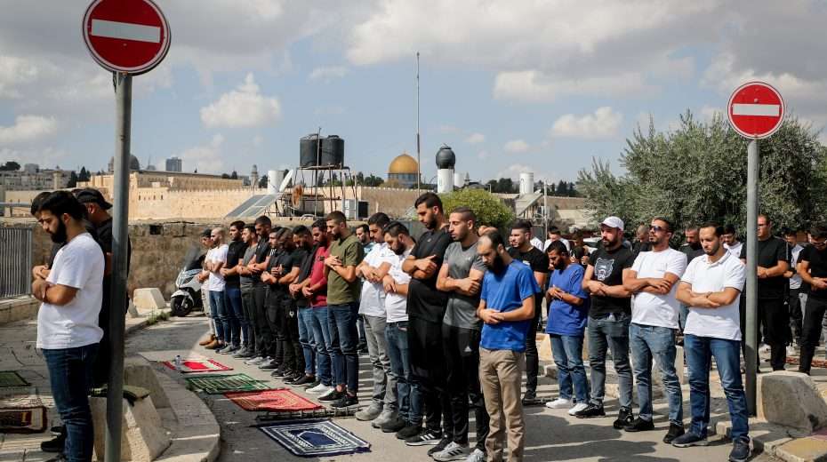 Muslim Palestinians pray in East Jerusalem's Ras el Amud neighborhood outside the Old City of Jerusalem on October 20, 2023. Photo: Jamal Awad/FLASH90