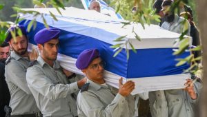 Family members and friends of late Israeli soldier Arnon Benbenisti Vaspi who was killed in action in Gaza attend his funeral at the Rosh Pina Cemetery on November 21, 2023. Photo by Michael Giladi/Flash90