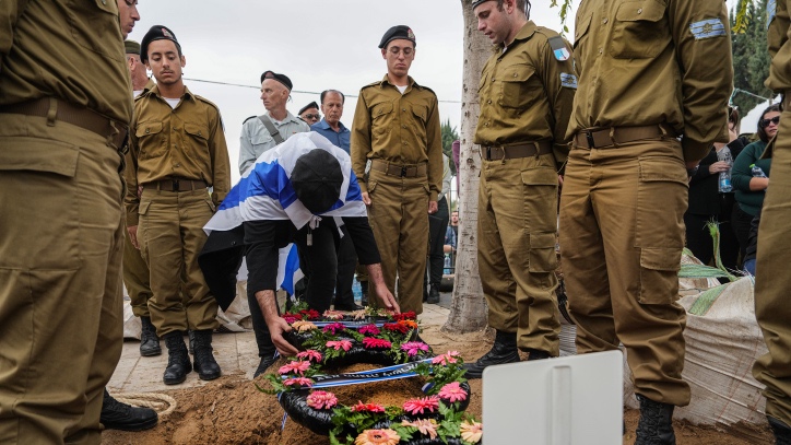 Family and friends of Israeli soldier Staff Sergeant Tuval Yaakov Tsanani mourn during his funeral in Kiryat Gat, on December 5, 2023. He was killed during a ground operation in the Gaza Strip. Photo by Flash90