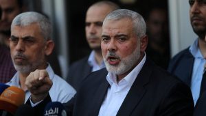 Hamas senior political leader Ismail Haniyeh, who lives in Qatar, speaks to the press upon his arrival at the Rafah border crossing from Egypt in the southern Gaza Strip, Sept. 19, 2017. Photo by Abed Rahim Khatib/ Flash90.