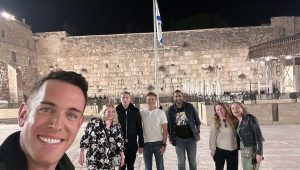 A group of media influencers and journalists who toured Israel as part of a mission led by Shai DeLuca, a Canadian-Israeli interior designer, seen in front of the Western Wall in Jerusalem, Dec. 4 to Dec. 7, 2023. Credit: Courtesy.