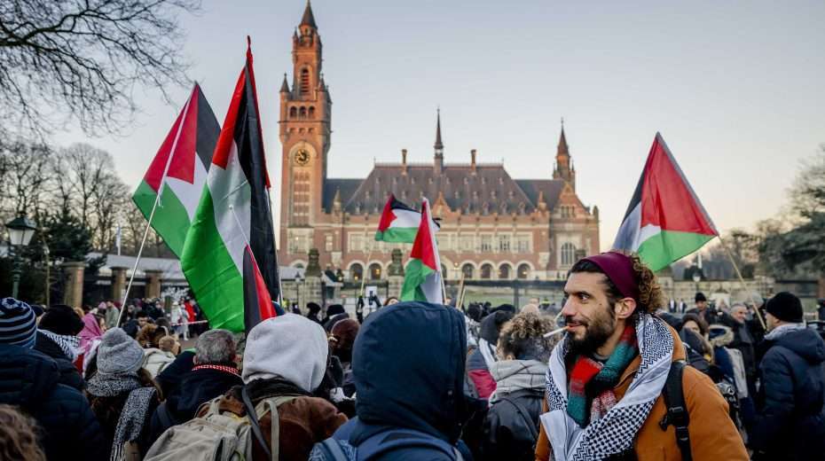 Palestinian activists gather outside the International Court of Justice (ICJ) in The Hague, Netherlands, ahead of the hearing on a suit filed by South Africa against Israel for genocide in Gaza. EPA-EFE/REMKO DE WAAL