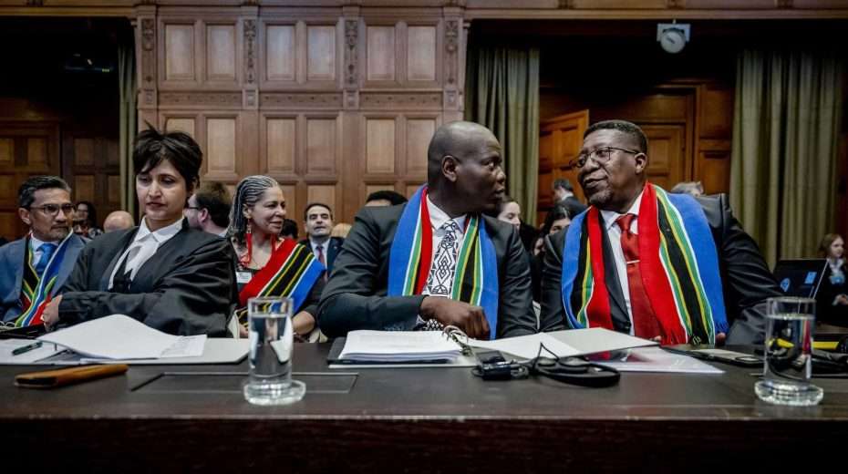 The best show in town - Ronald Lamola (C), South African Minister of Justice, and Vusimuzi Madonsela (R), South African Ambassador to the Netherlands, before the hearing of South Africa's genocide case against Israel at the International Court of Justice (ICJ) on January 11, 2024. Photo: EPA-EFE/REMKO DE WAAL