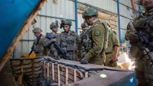 Israeli forces examining rocket parts in the largest weapons manufacturing site found since the start of the war against Hamas in Gaza, Al-Bureij camp, central Gaza, Jan. 8, 2024. Credit: IDF.