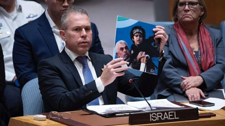 Gilad Erdan, Israeli ambassador to the United Nations, shows a photo Yahya Sinwar, Hamas’s chief in the Gaza Strip, holding a young child with an automatic weapon at a U.N. Security Council meeting on Nov. 22, 2023. Credit: Courtesy of Israeli Mission to the U.N.